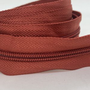 CIERRE POR METRO CADENA NYLON N5 (6mm) X 10m + 10 Deslizadores Marroquineros - Ladrillo, Rollos